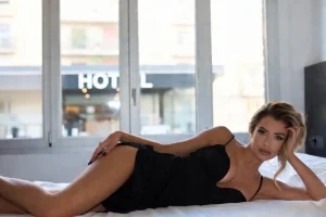 a luxury seductive woman in a hotel room in barcelona