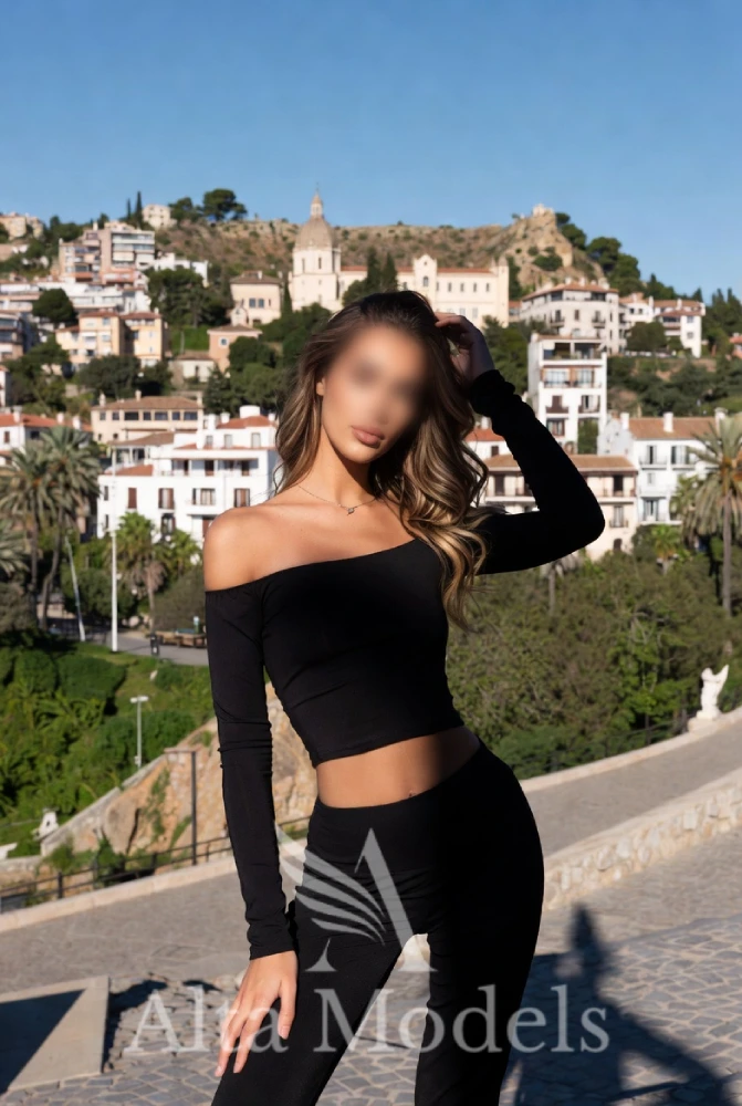 luxury young spanish escort companion Coral in sitges in sporty outfit
